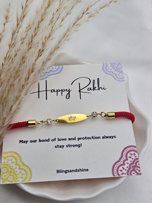 Gold plated rakhri/ Rakhi - Red string (NO ADJUSTABLE BAND)