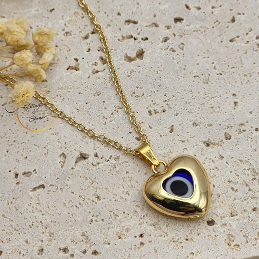 Evil eye heart pendant